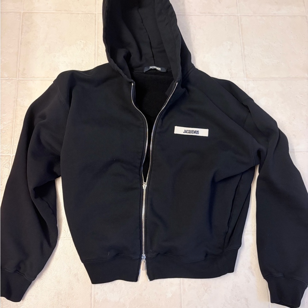 Jacquemus Black Zip-Up Hoodie

Pit to pit is 25 
 Length is 25